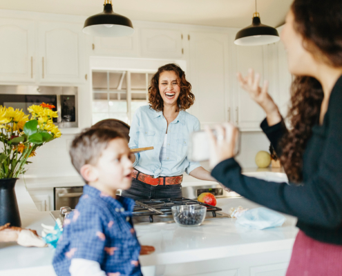 Jovial family in kitchen