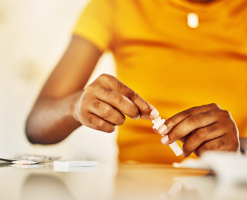 Woman conducting drug self test