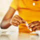 Woman conducting drug self test