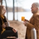 Two people at the lake talking